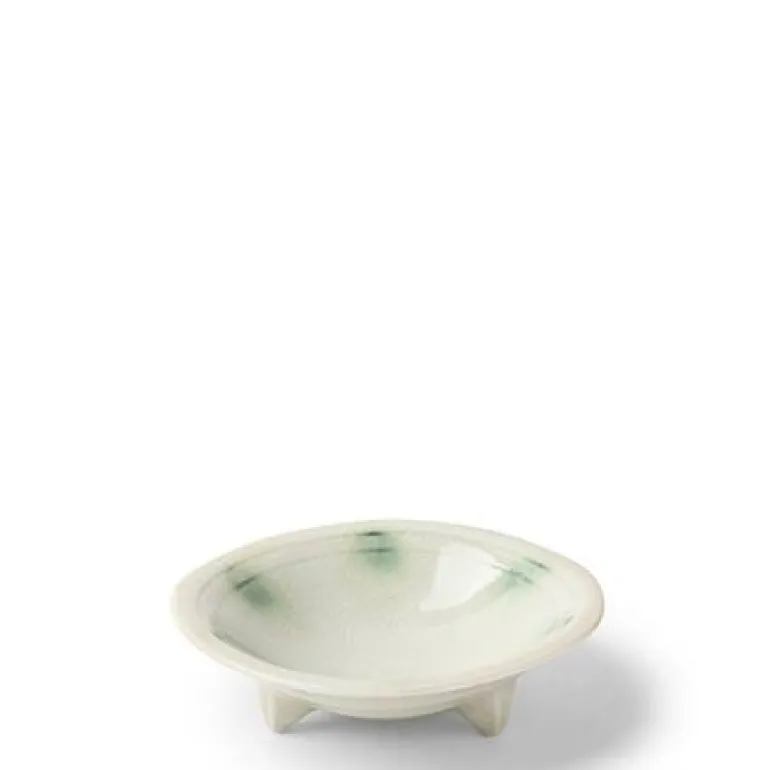 Beautiful green and white glaze on ceramic dishes made in Japan available at Miya.