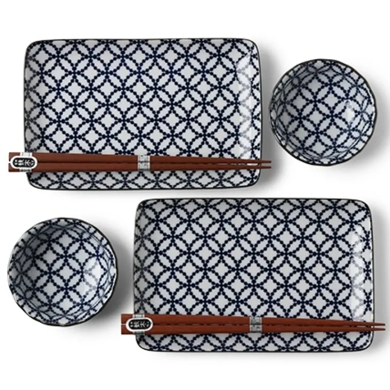 Blue and white shippou pattern on a ceramic sushi for two set made in Japan available at Miya.